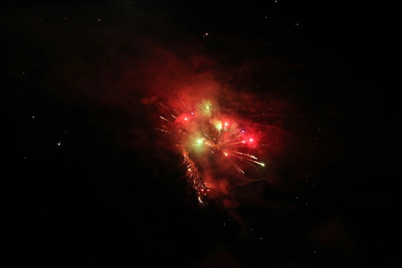 fireworks flashing on top of each other in the night sky