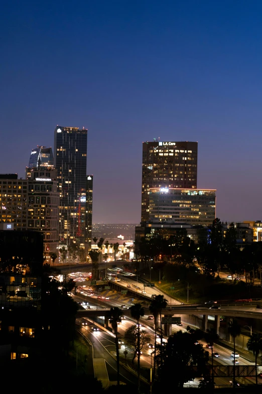 a city at night with a number of cars in it