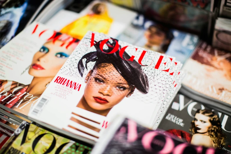 a variety of magazine covers on a table