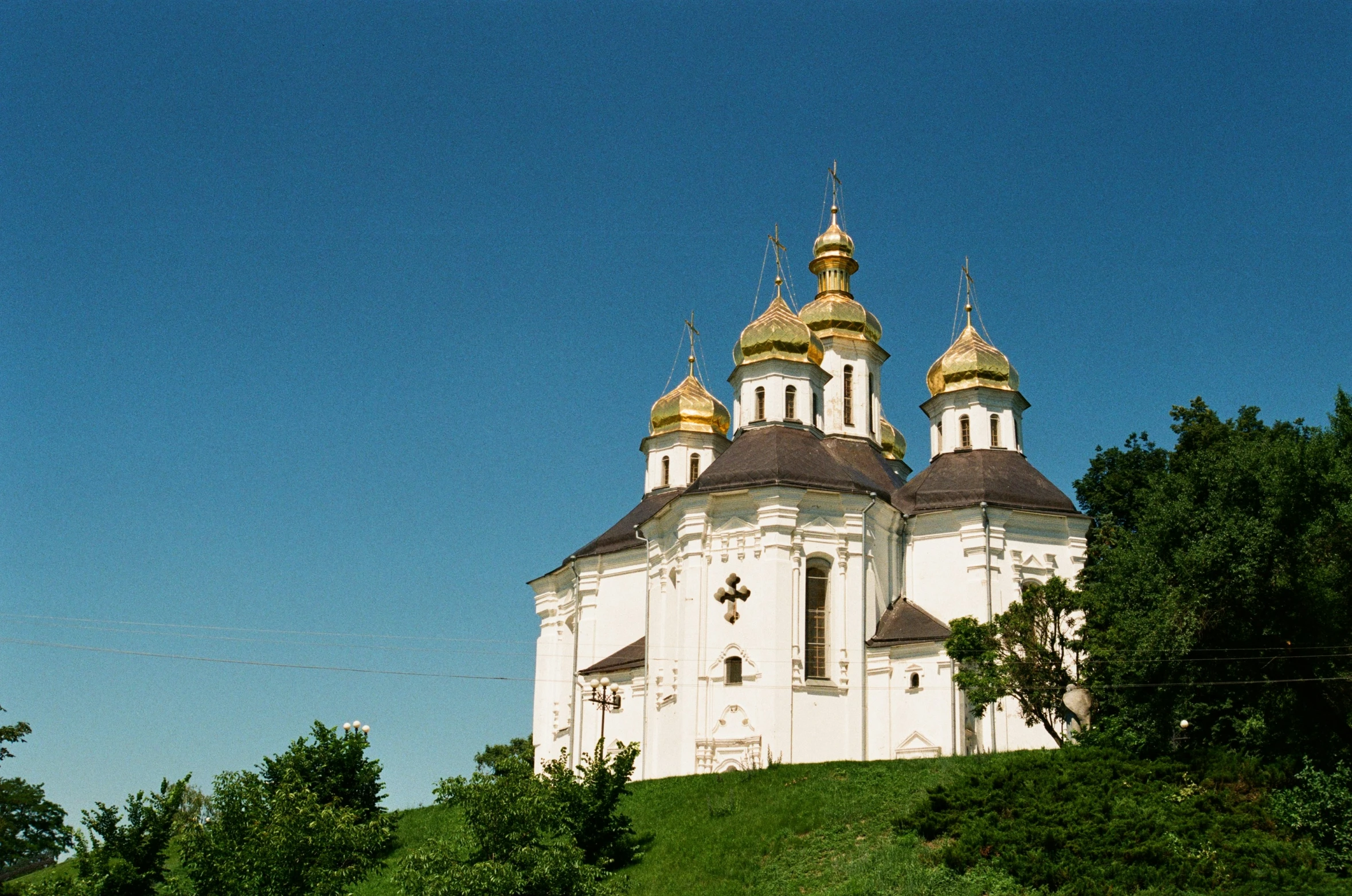 a building that has two gold spires on it