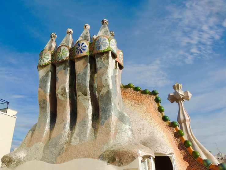 a unique and colorful church has elaborate roof and bell tower