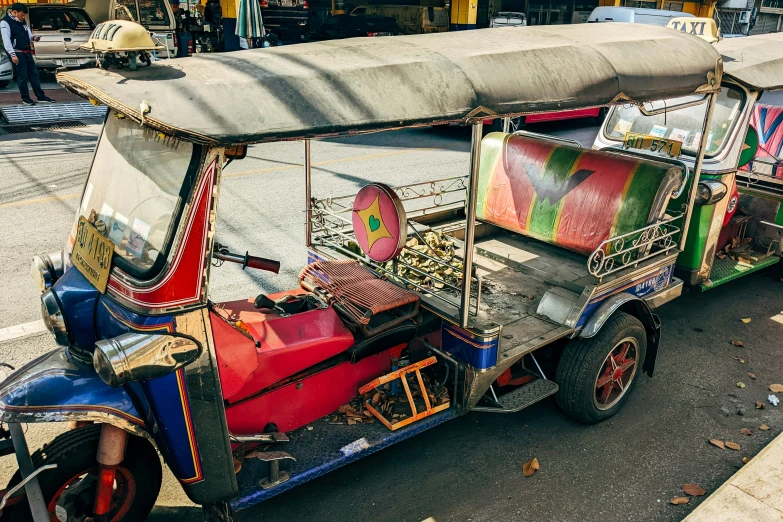 a street scene with a car and a golf cart