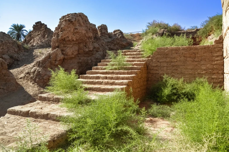 stairs leading up a hill with no one on them