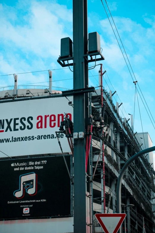 large commercial billboard near city street traffic light