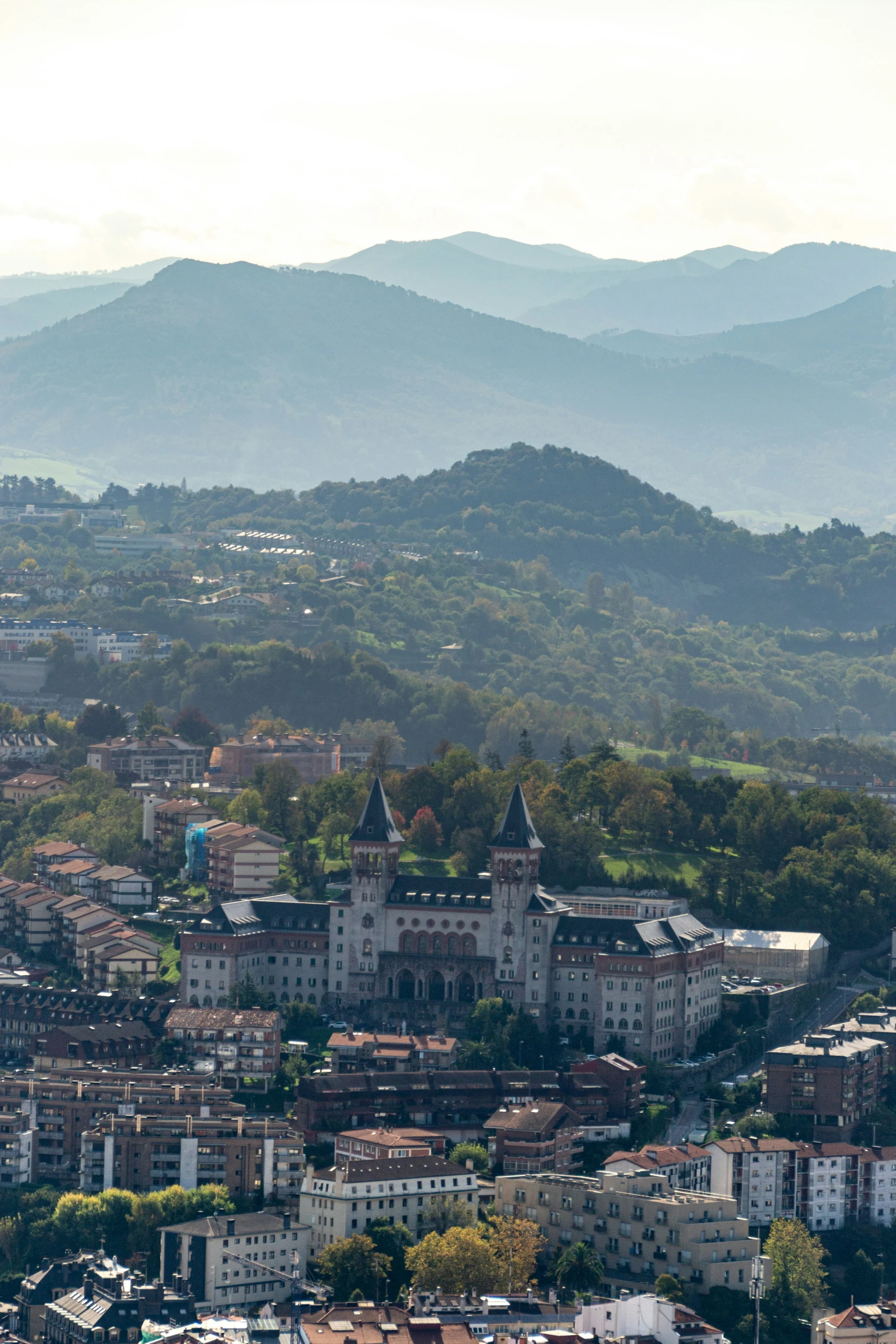 a town with some mountains in the background