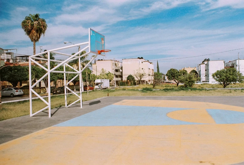 an empty basketball court is pictured in this image