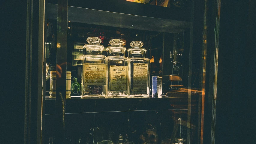 jars that have been put inside of a shelf