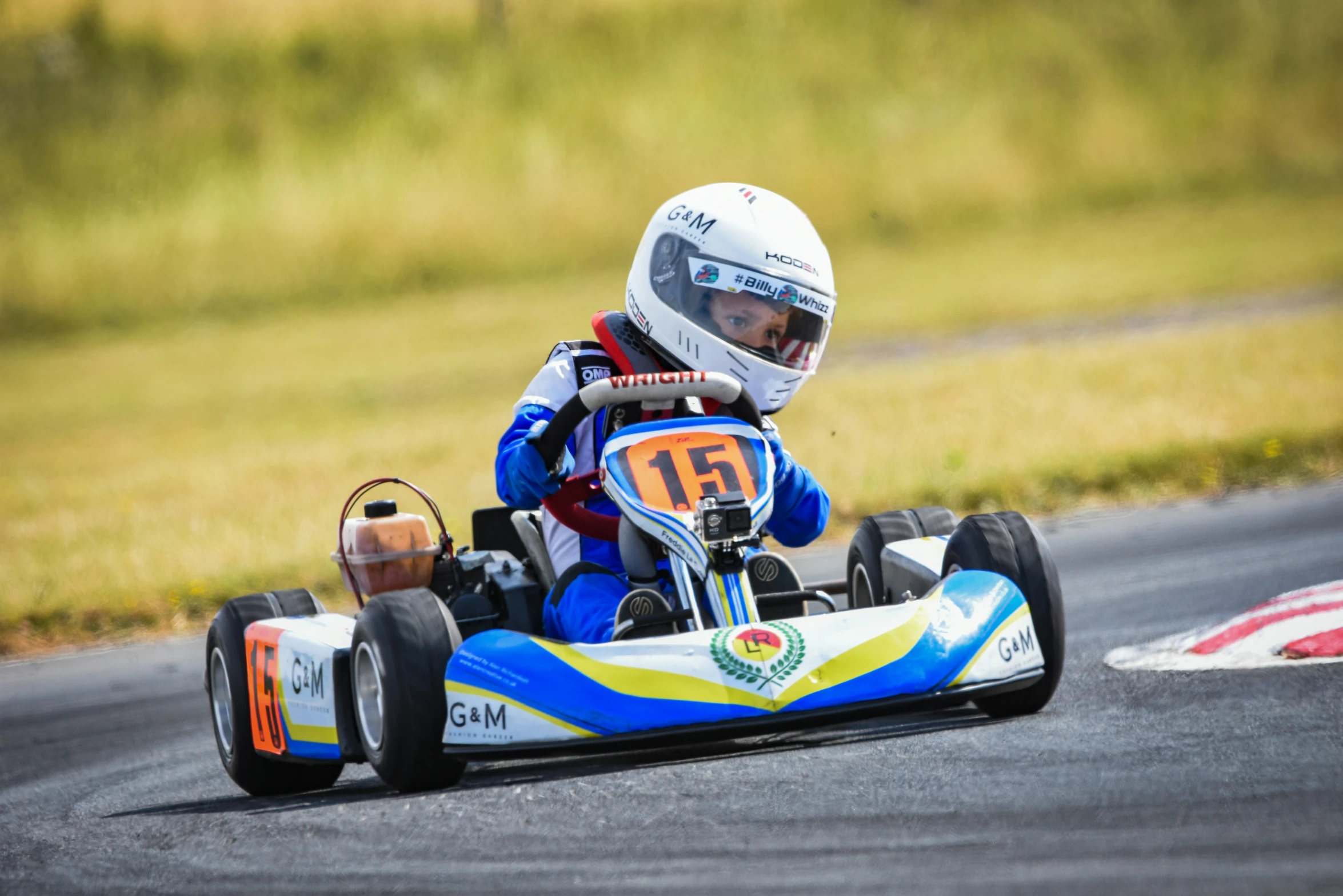 a  racing a go kart on the track