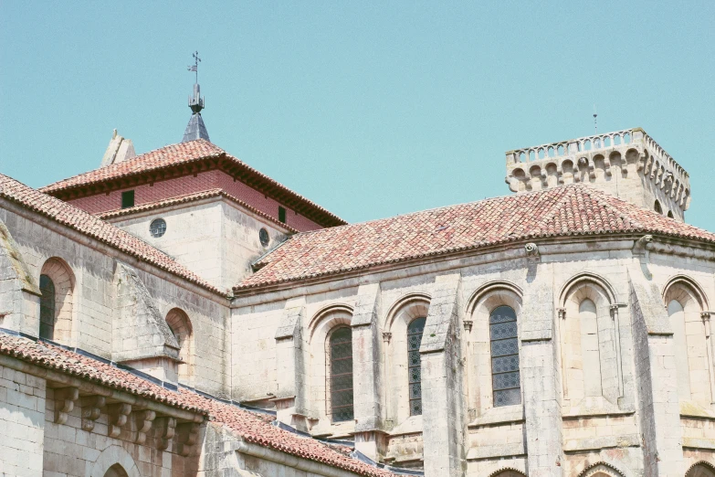 the building is very ornate with many windows and spires