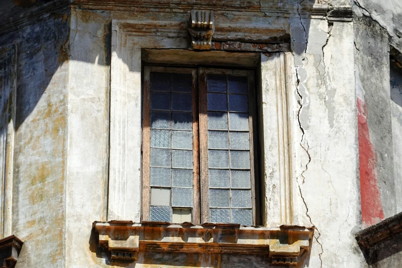 a building with lots of windows and a couple bars attached to the side