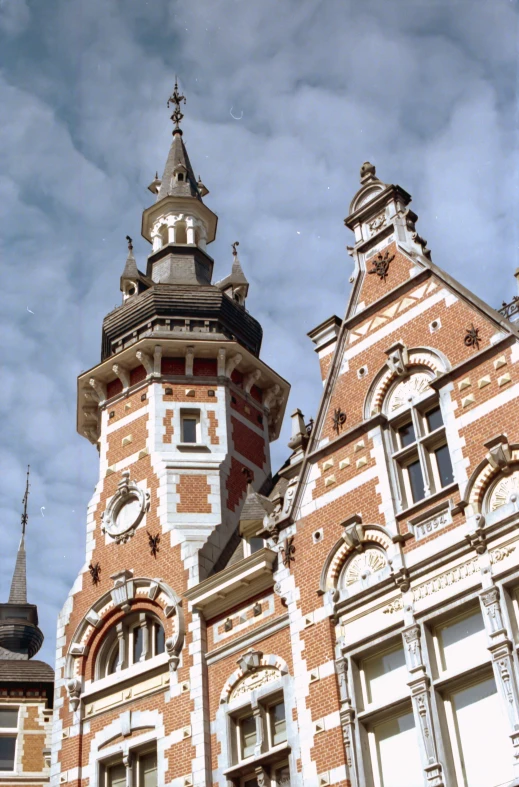 an ornate building with two towers and a clock
