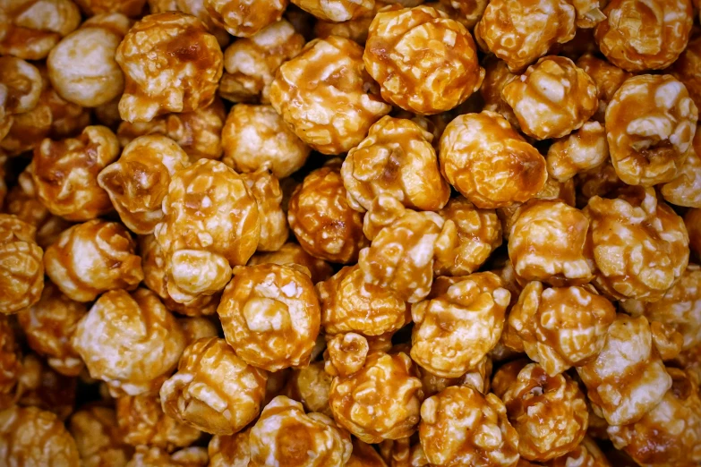 a bowl full of sugar coated caramel popcorn