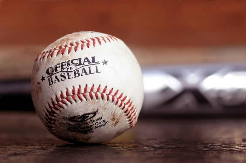 close up of a baseball on a table