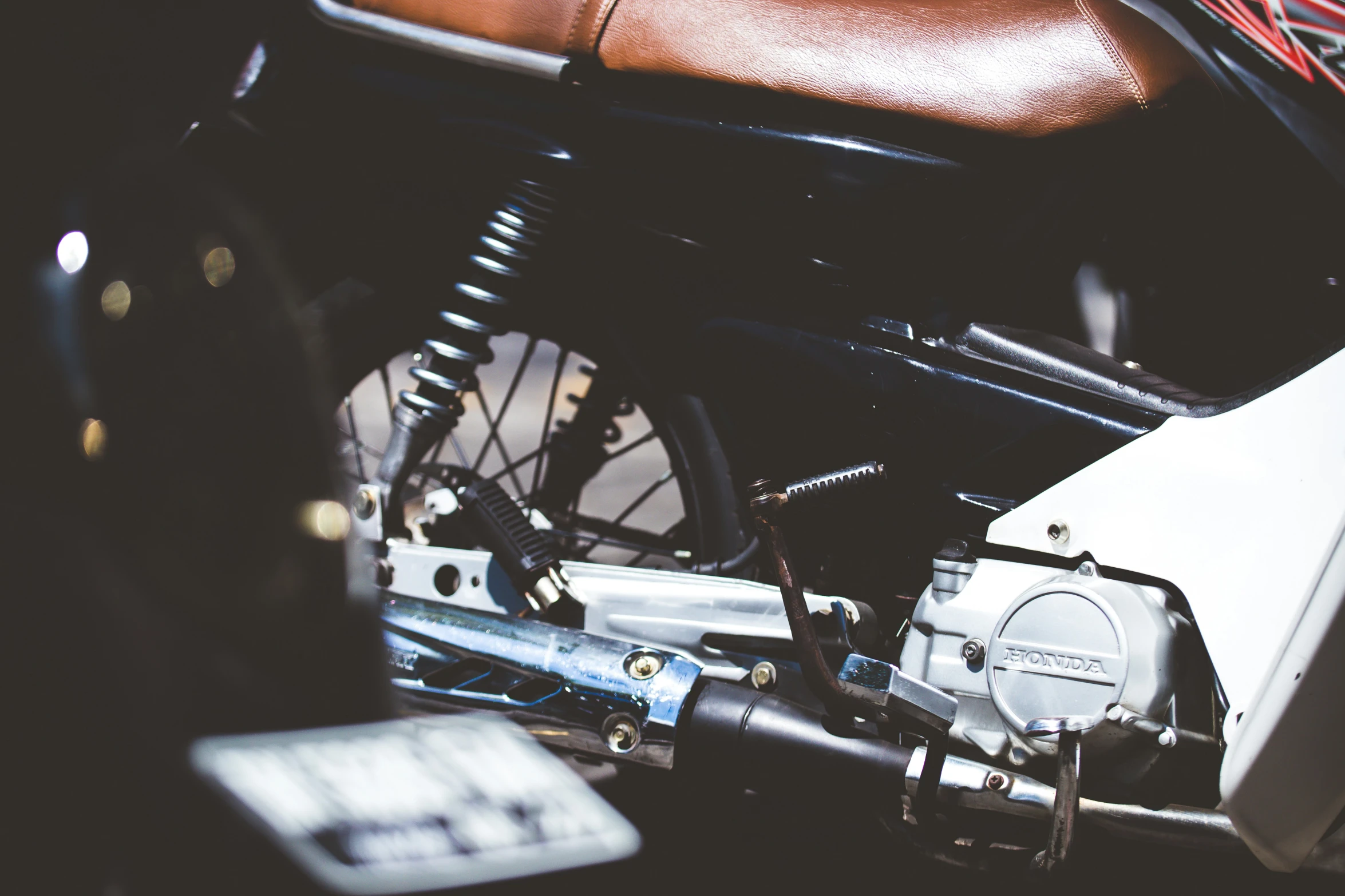 a black and white pograph of a motorcycle