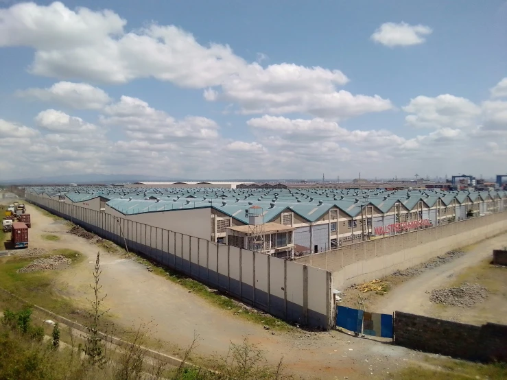 the building is fenced in with some buildings