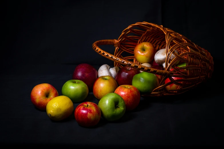 an image of some red and green apples in the basket