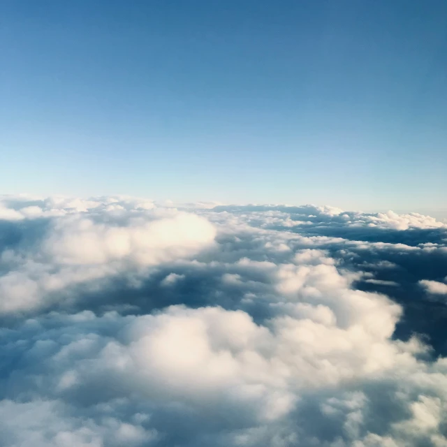 there are clouds in the sky as seen from above