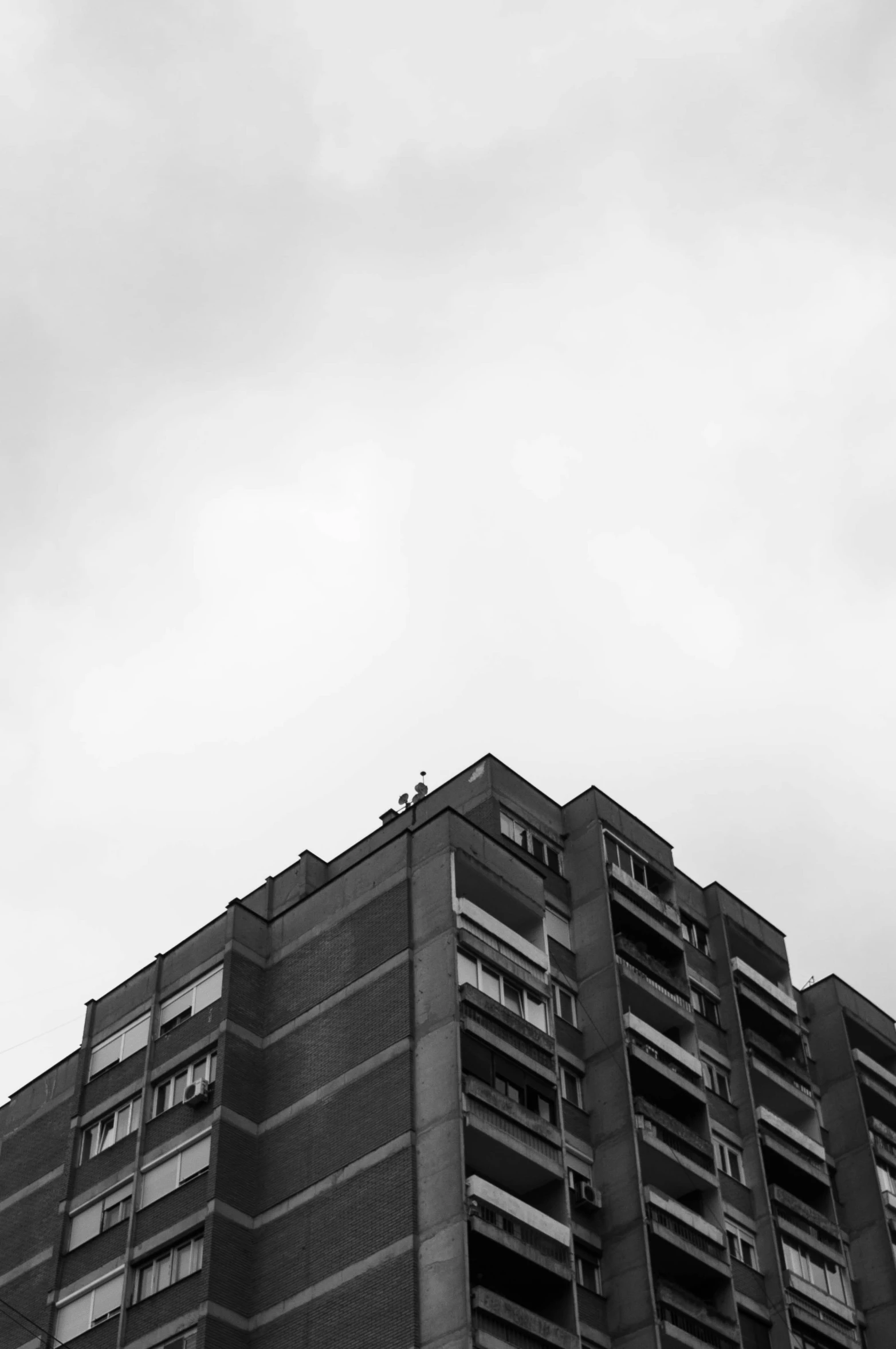 a building with a lot of balconies and balconies on top