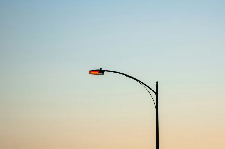 a street lamp with the red light out