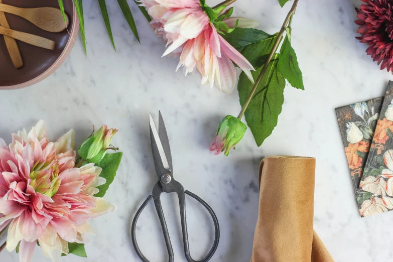 the flowers are laying next to each other on the counter