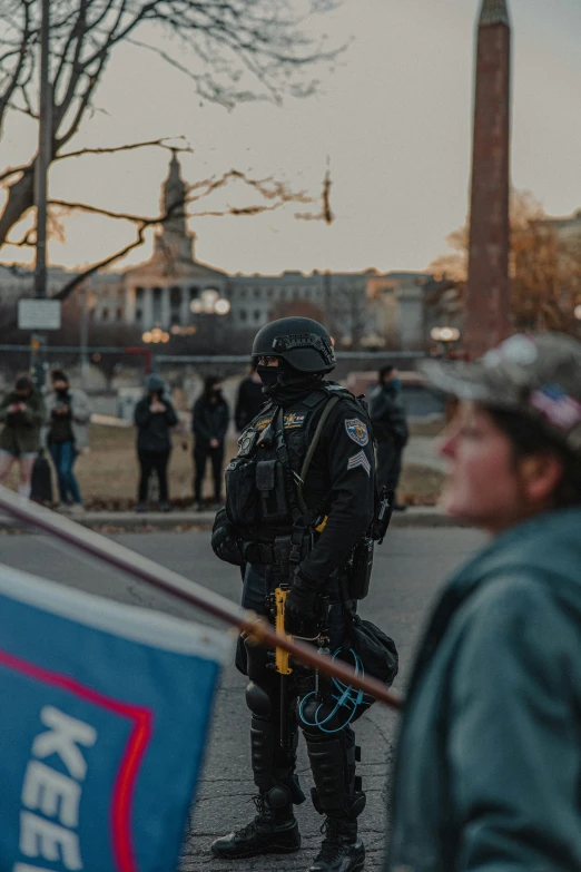 several police officers on a street