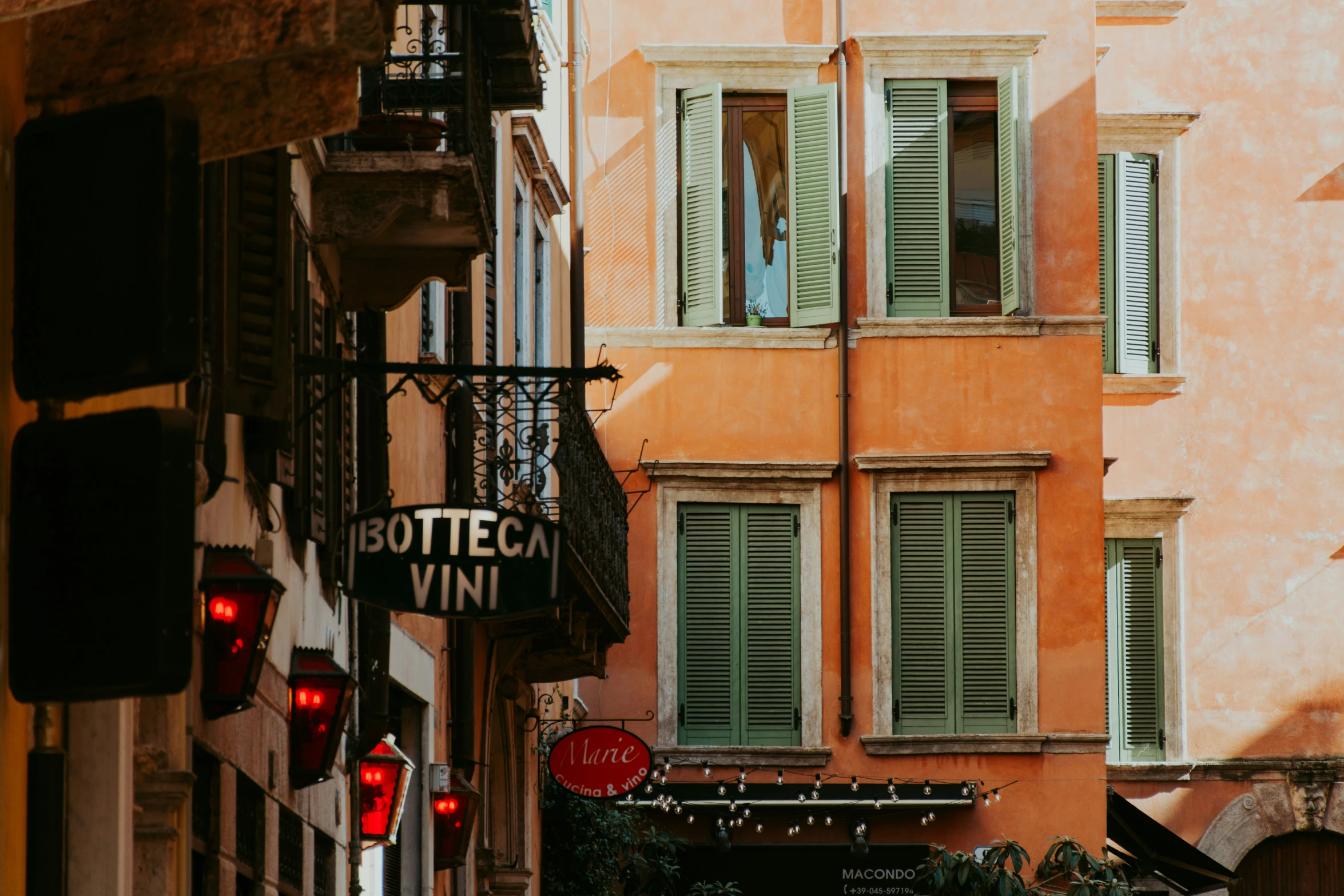 a building on a city street with a sign in front of it