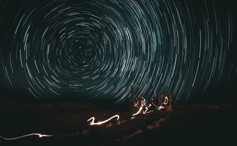 the star trails are captured across the sky