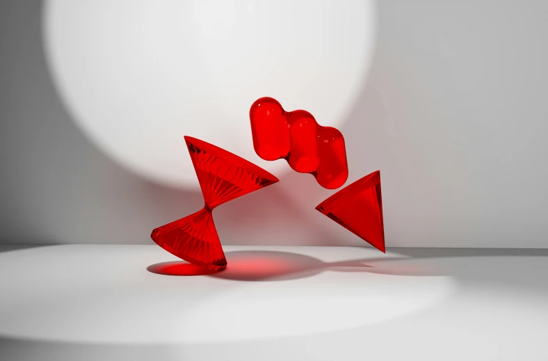 the modern art has red sculptures in an array of shapes