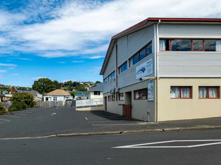 an apartment complex on a clear day with blue skies