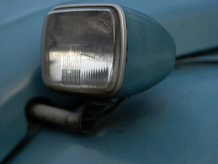 a car's side light is displayed from underneath