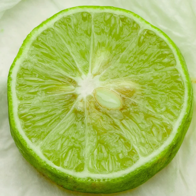 the fresh lime has been sliced into halves