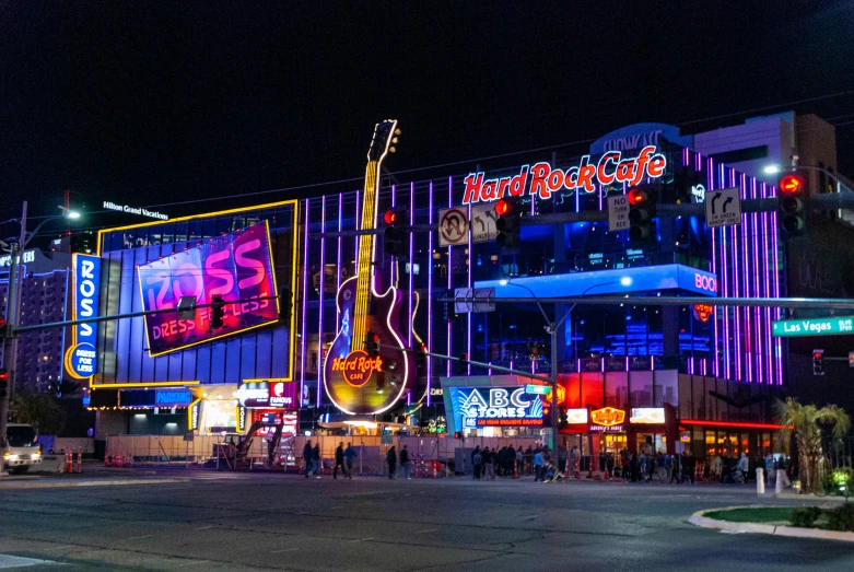 the city has neon lights in the middle of it