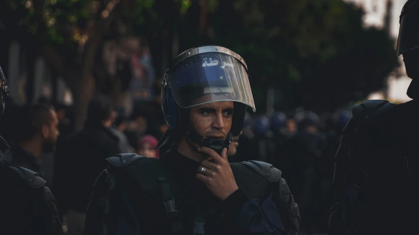 two policemen walking away from an occupy state