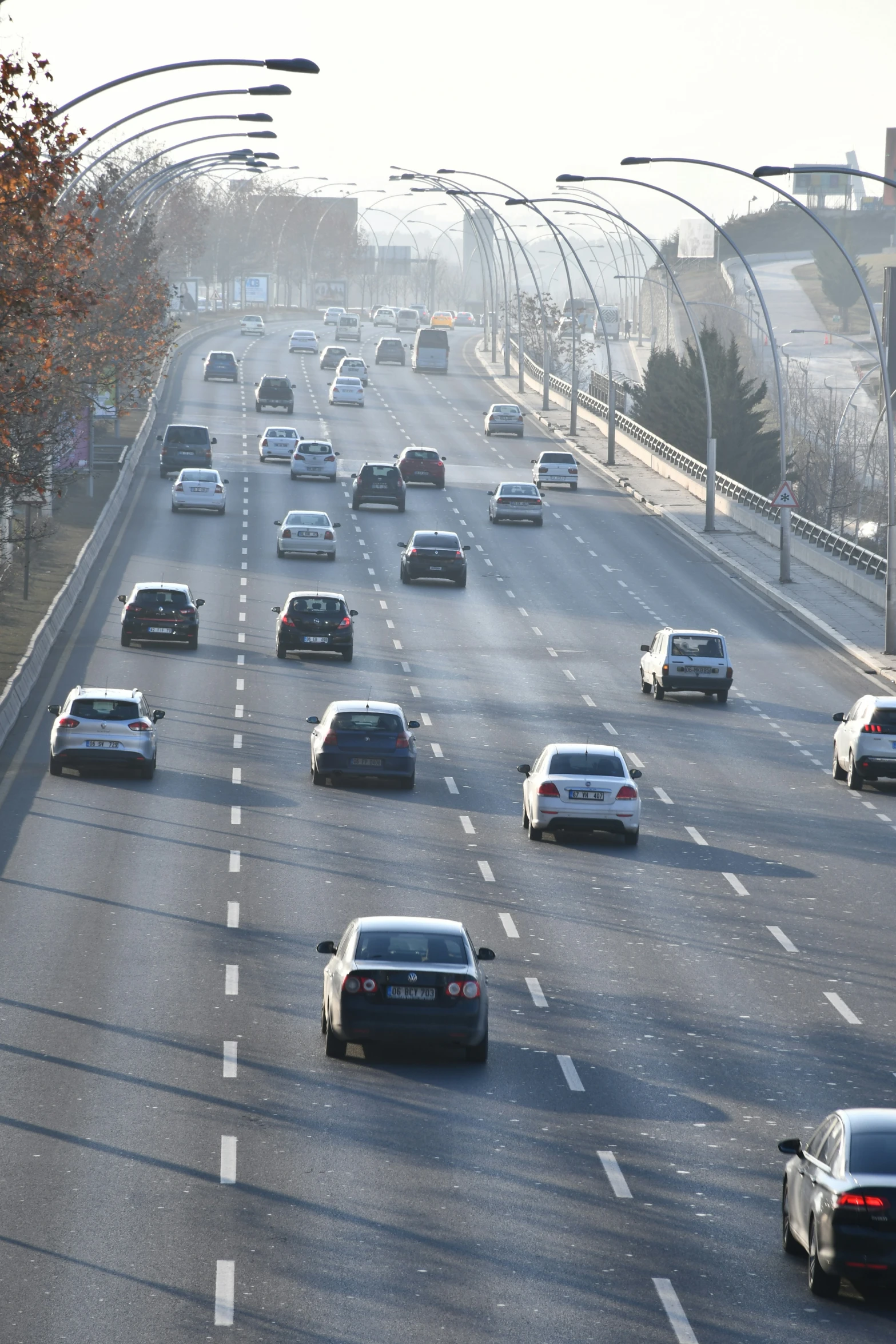 traffic on highway with light traffic driving down it