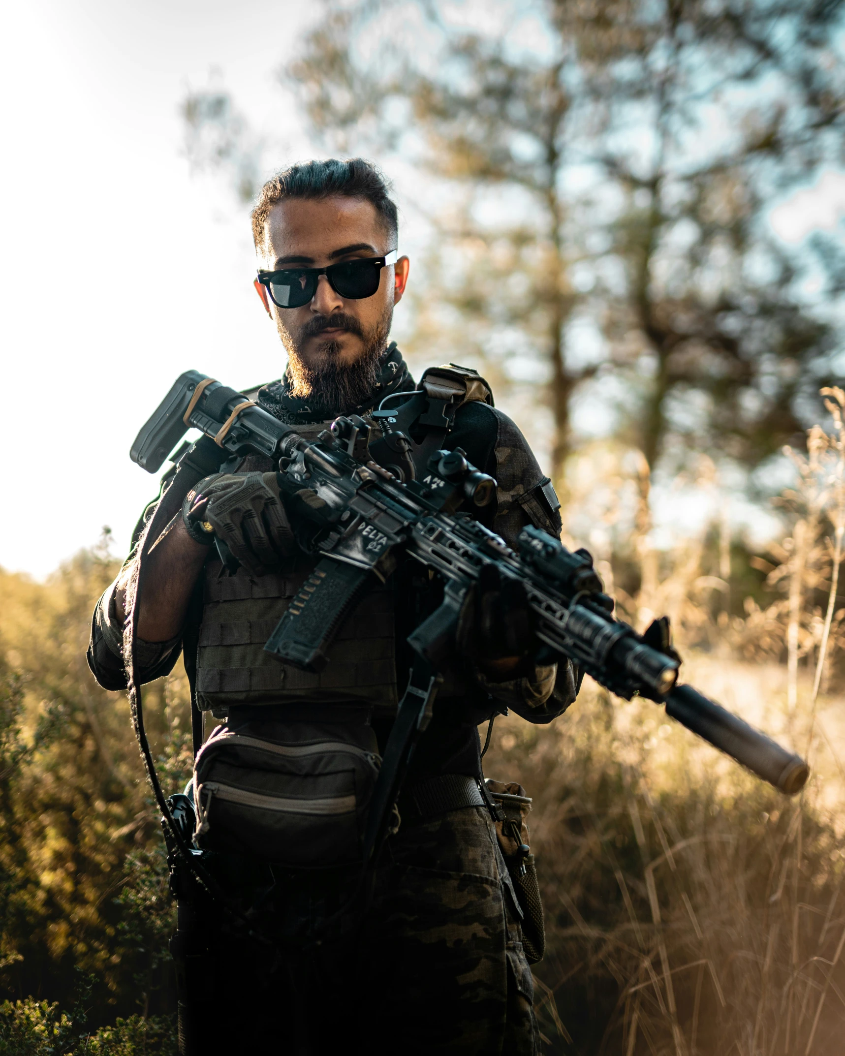 a man holding a rifle in his hand