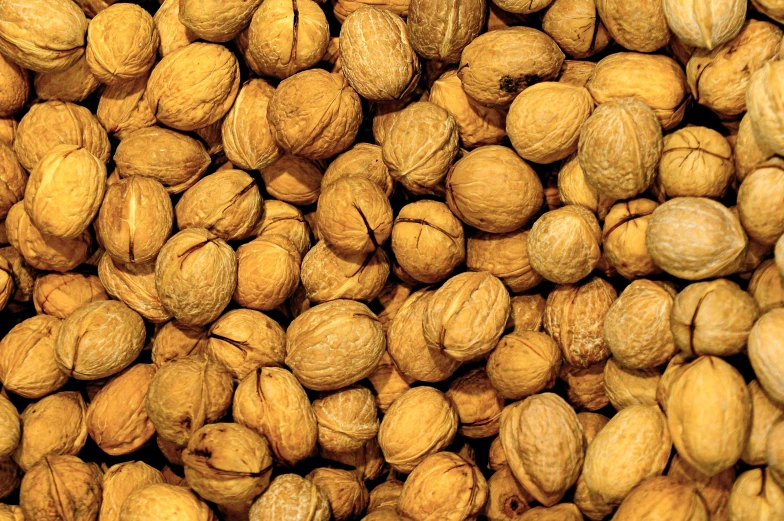 an image of a pile of almonds closeup