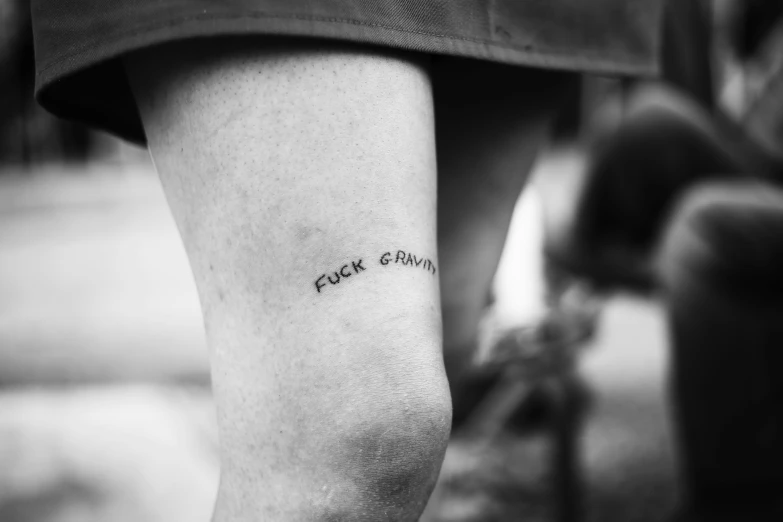 a woman's leg is shown with the word follt written on it