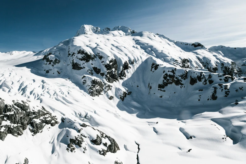 a view of a large mountain covered in snow