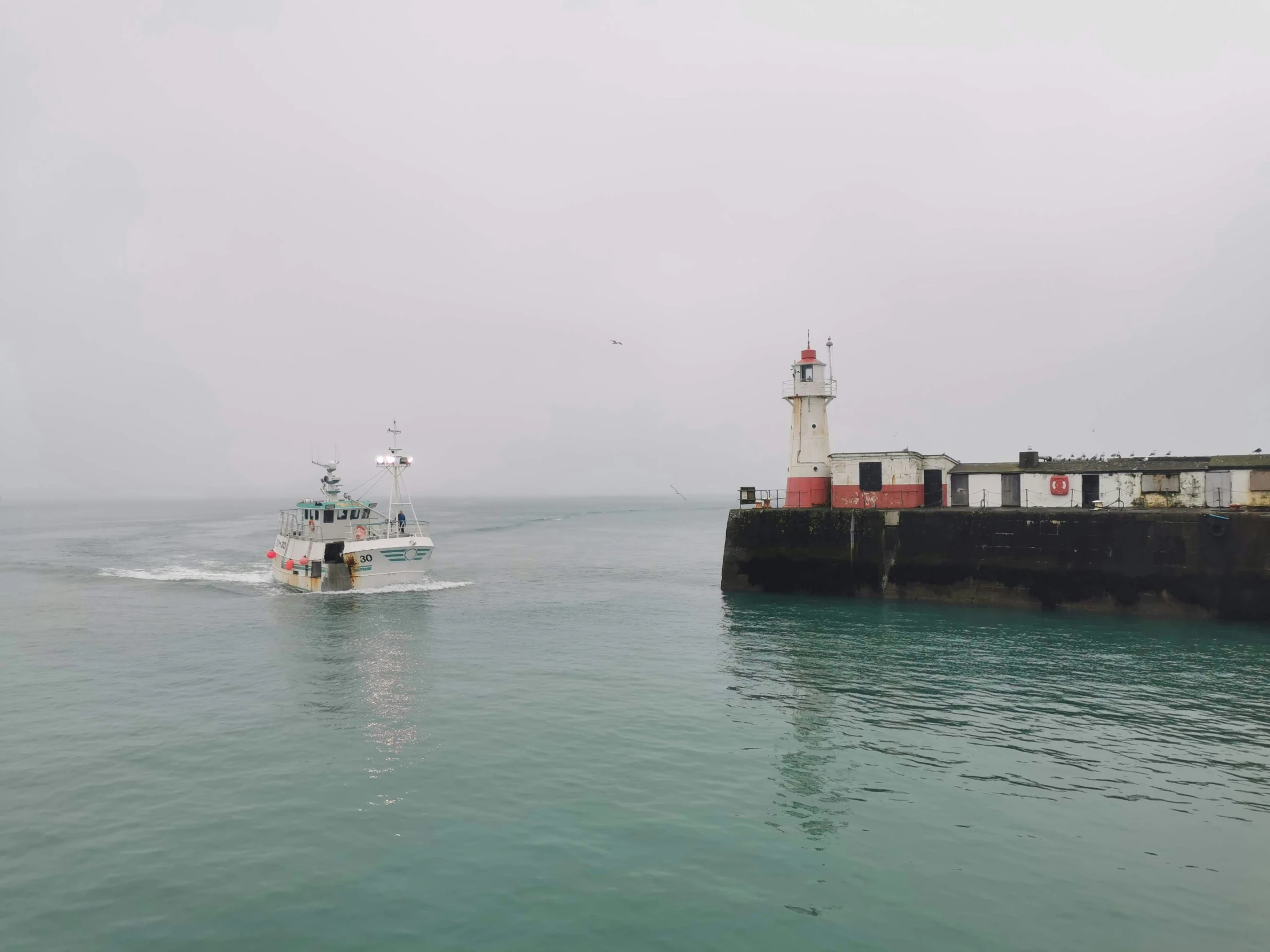 a boat that is sitting in the ocean