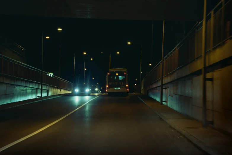 a truck that is driving by some buildings