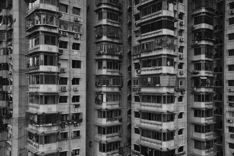 an urban skyscr filled with windows and balconies