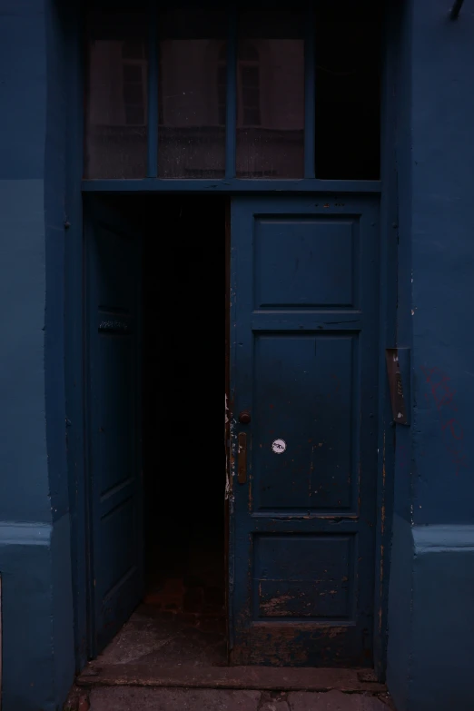 a dark doorway that leads to another room