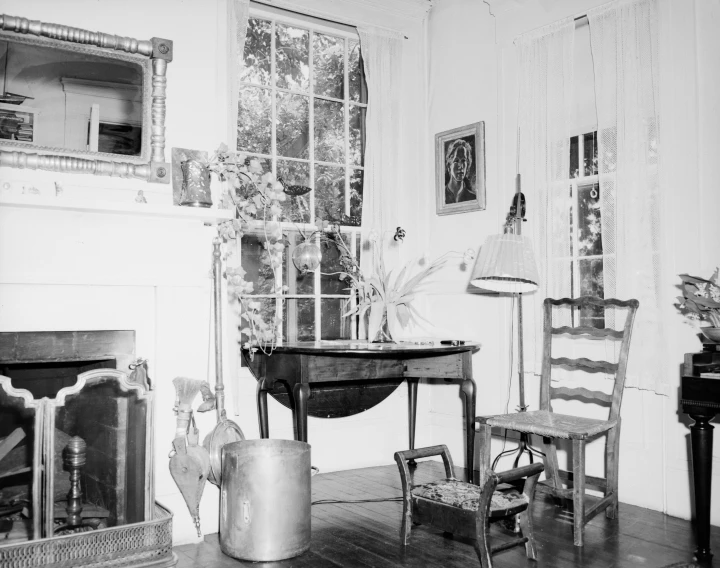 old fashioned room with a piano, rocking chair and other furniture