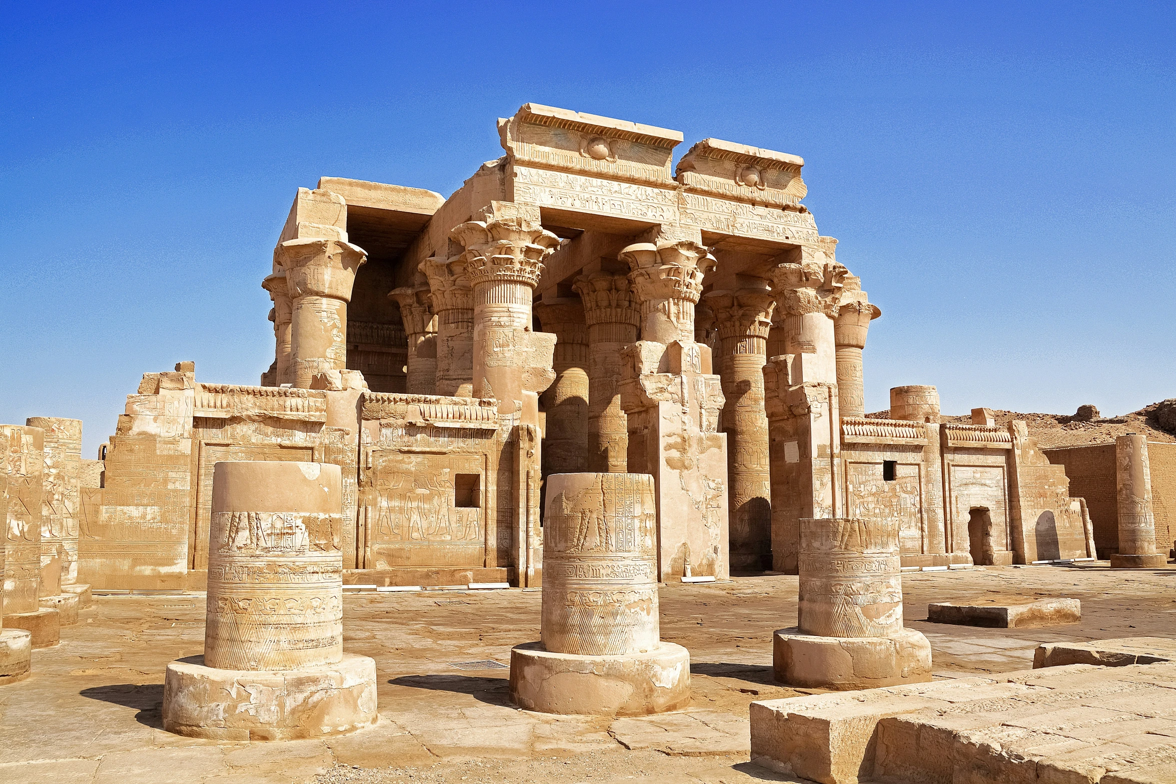 a large number of pillars in the middle of a building