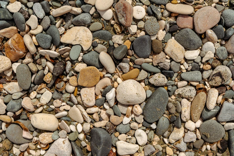 lots of rocks and gravel on a surface