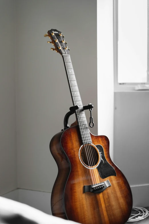 an ukulele guitar is set up on a table