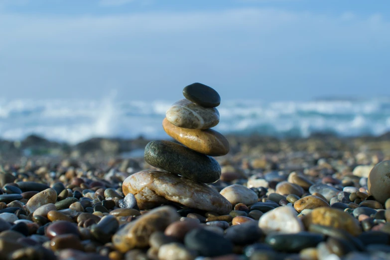 an arrangement of various rocks are stacked on top of each other