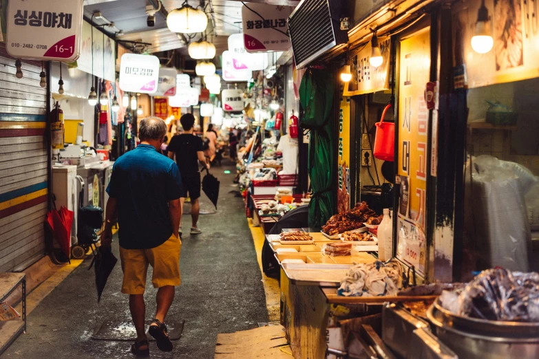 an alley that shows people walking through it