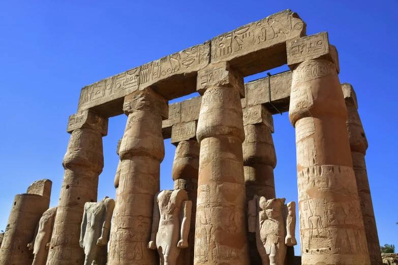 a stone structure that is outside in the day