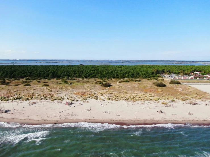 an aerial view of a beach in the ocean